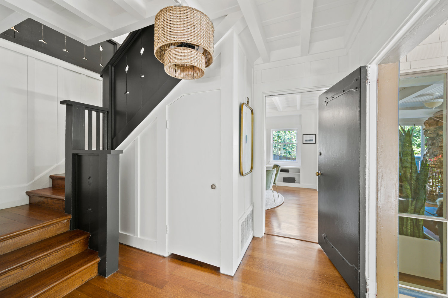 Property Photo: Entryway. Staircase leads to upper level. 