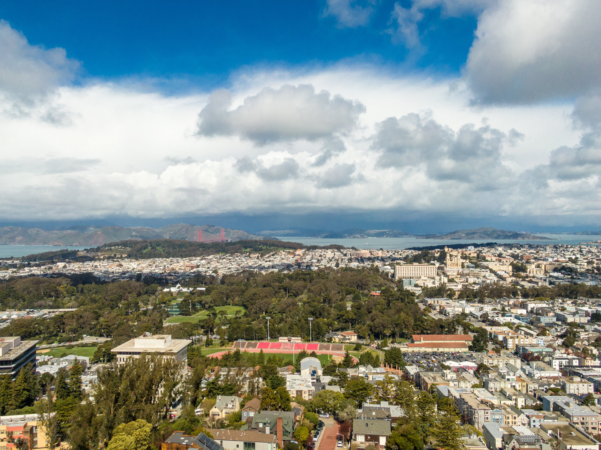 Property Photo: Aerial photo. You can see Kesar Stadium, Golden Gate Park, and the Golden Gate Bridge in the distance. 