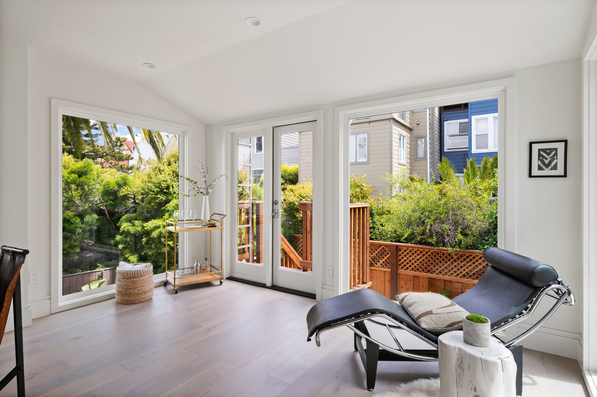 Property Photo: Sitting area has french doors that lead out to fire escape. 