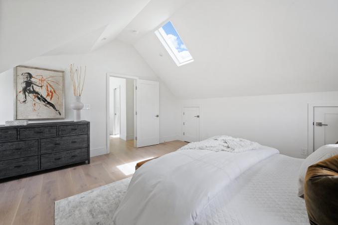 Property Thumbnail: Another photo of the primary showing the skylight. 