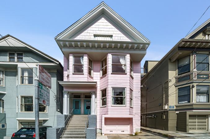 Property Thumbnail: Exterior view of 814-816 Cole Street, featuring a pink facade