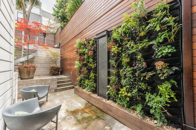Property Thumbnail: Living wall outside of primary suite. 