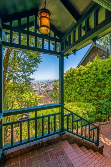 Property Thumbnail: Looking towards downtown from the top of front steps. Lots of lush greenery