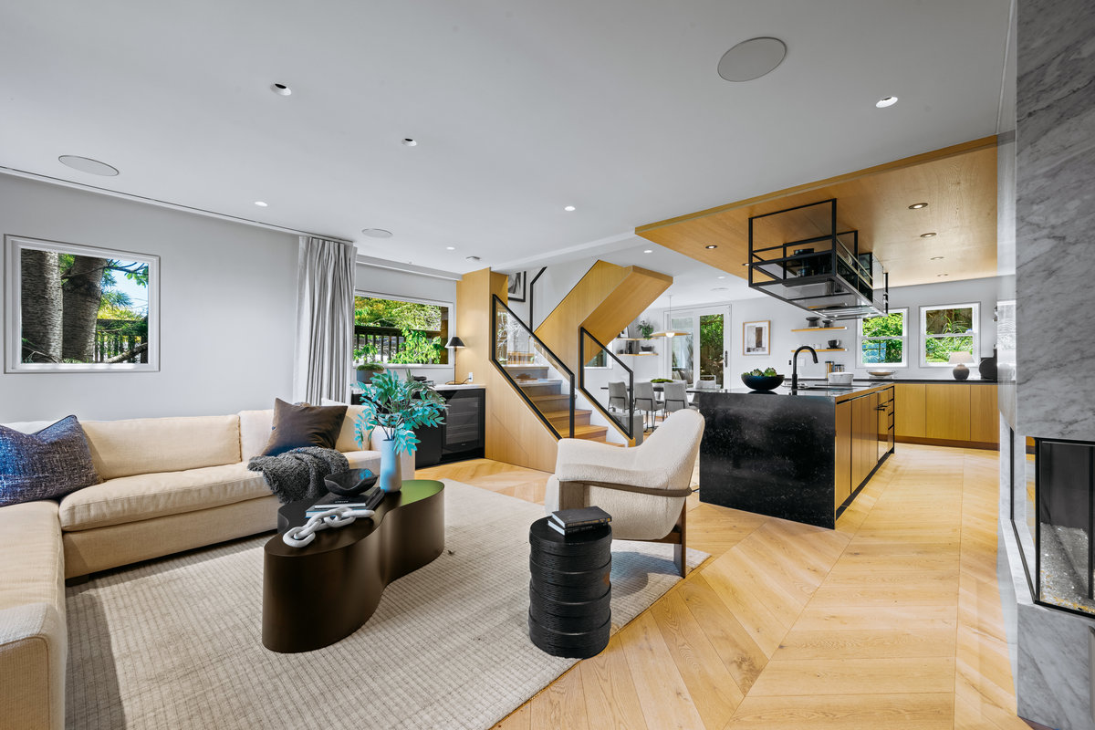 Property Photo: First level is open floor plan. This photo is looking over the livingroom from the front door.