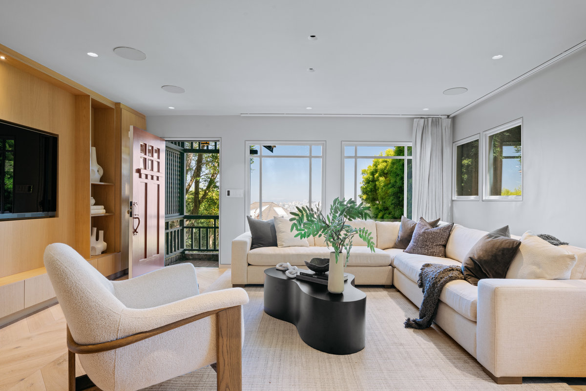 Property Photo: There are large windows in the living room that lets in lots of natural light.