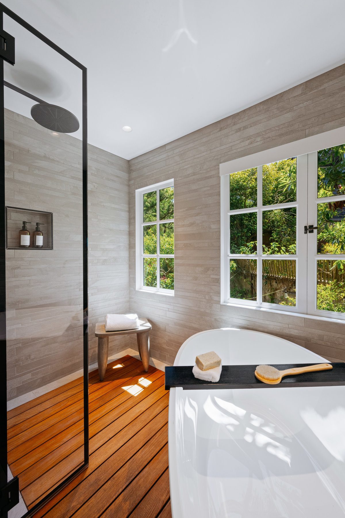 Property Photo: There is a large shower next the tub.