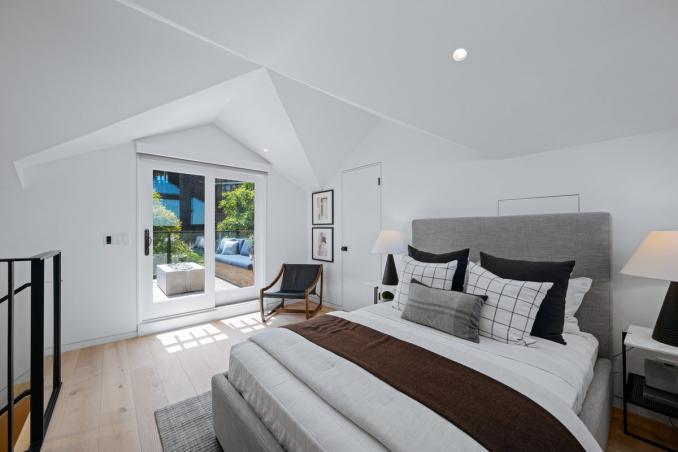 Property Thumbnail: There is a bathroom and doorway that leads out to back deck on the top floor.