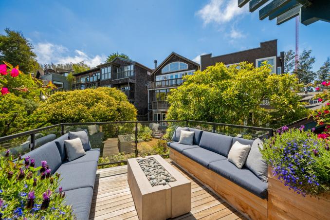 Property Thumbnail: Back deck has gas fireplace and built in benches on each side.