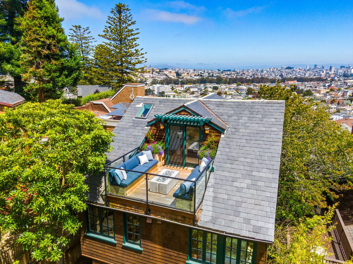 Property Photo: Aerial photo looking over the back deck, and over the top of the house looking at downtown san francisco.