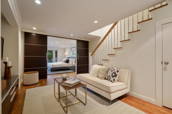 Property Thumbnail: View of the lower living area and partial view of an adjacent bedroom