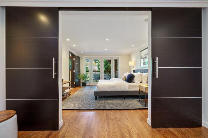 Property Thumbnail: View of a bedroom as seen between two large doors