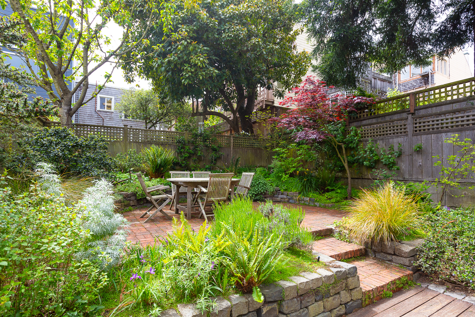 Property Photo: View of the yard and patio area at 157 Alma Street
