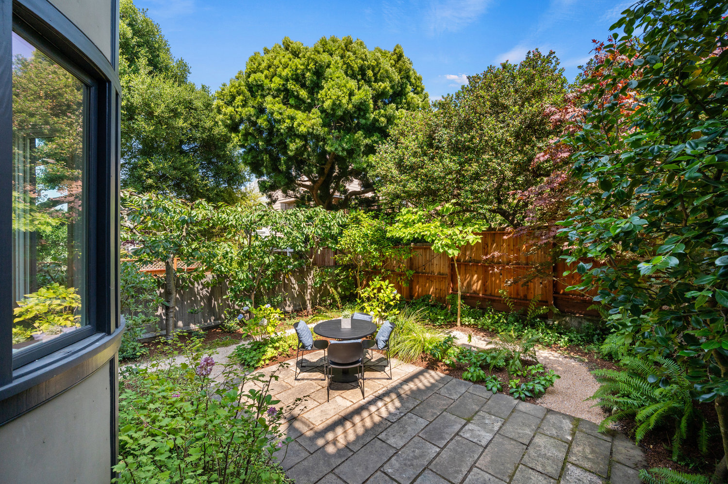 Garden with a patio and fruit trees at 828 Ashbury Street