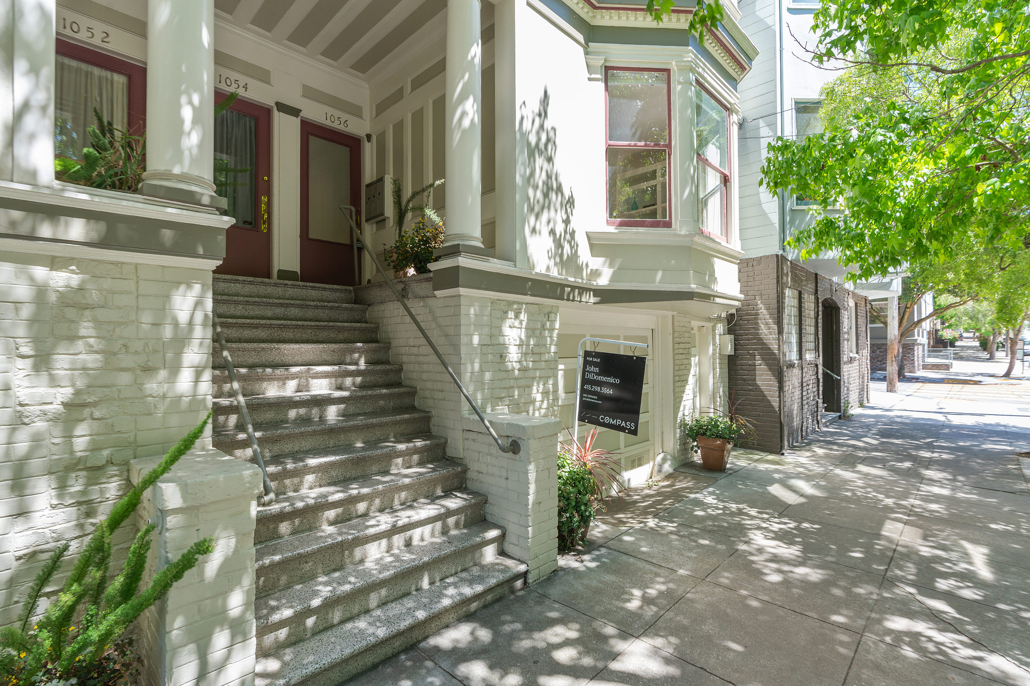 View of a San Francisco home for sale, with a sign for agent John DiDomenico