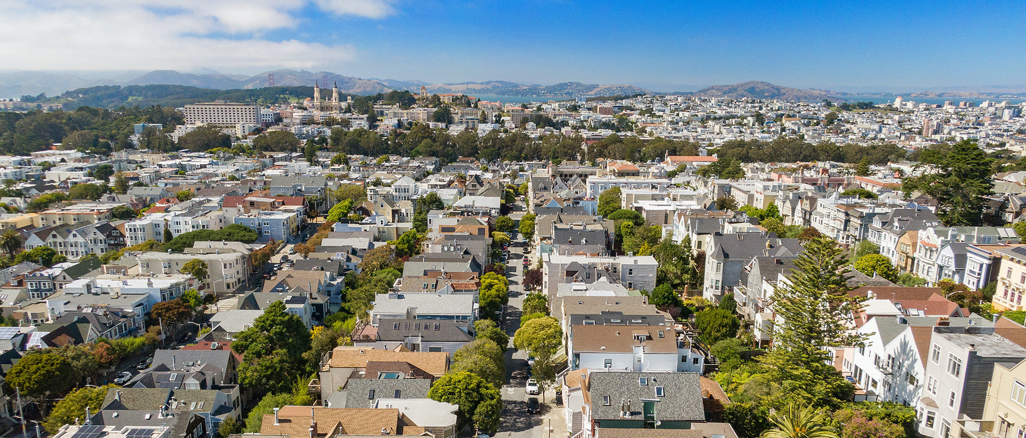 Aerial view of Downey Street in Ashbury Heights, showing a pretty tree lined street in San Francisco, CA