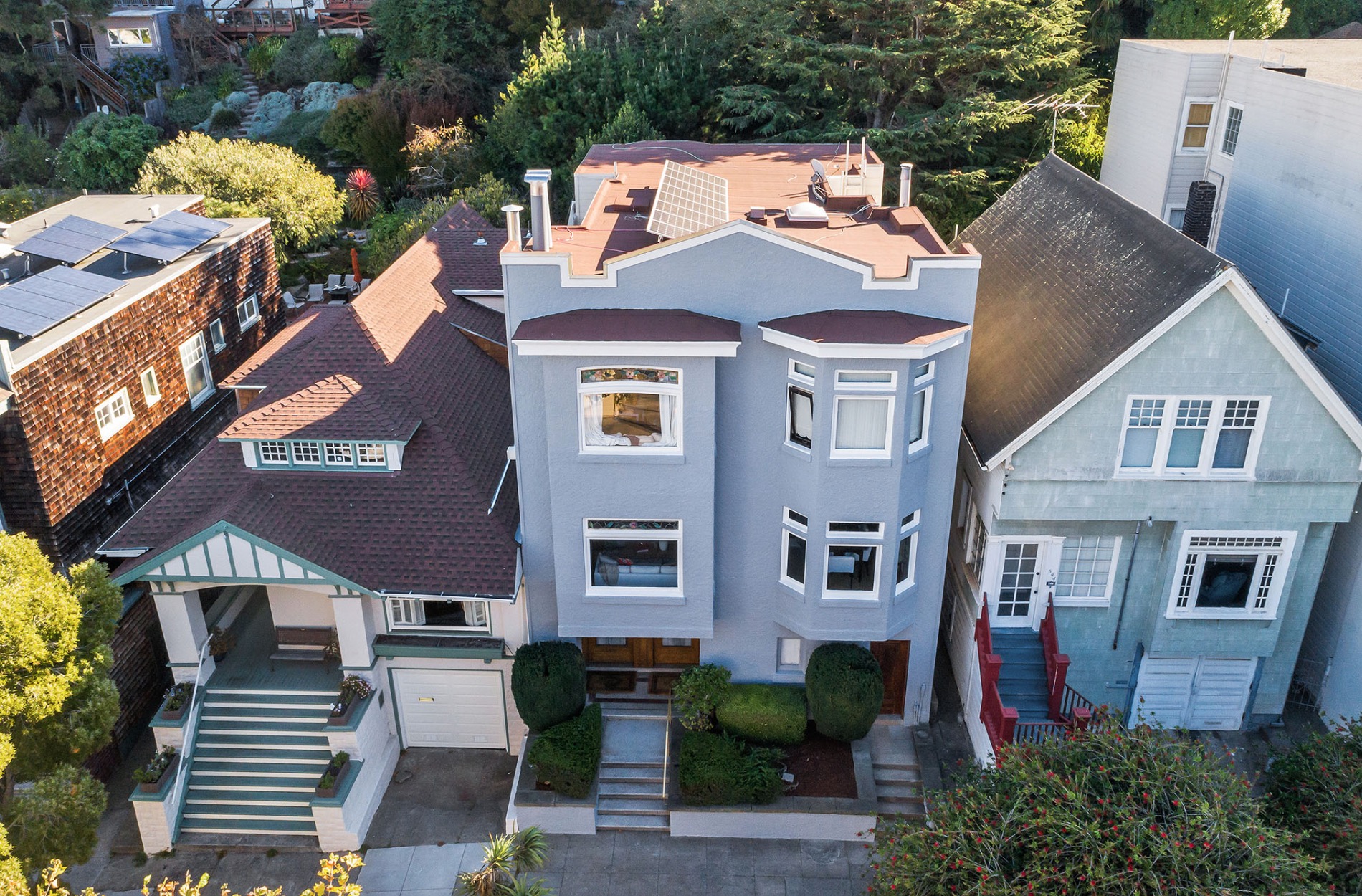 Property Photo: Aerial view of 540-542 Belvedere Street, showing a pale blue home