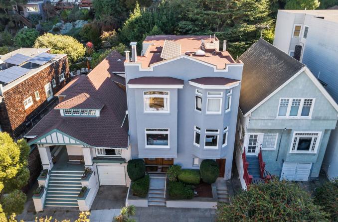 Property Thumbnail: Aerial view of 540-542 Belvedere Street, showing a pale blue home