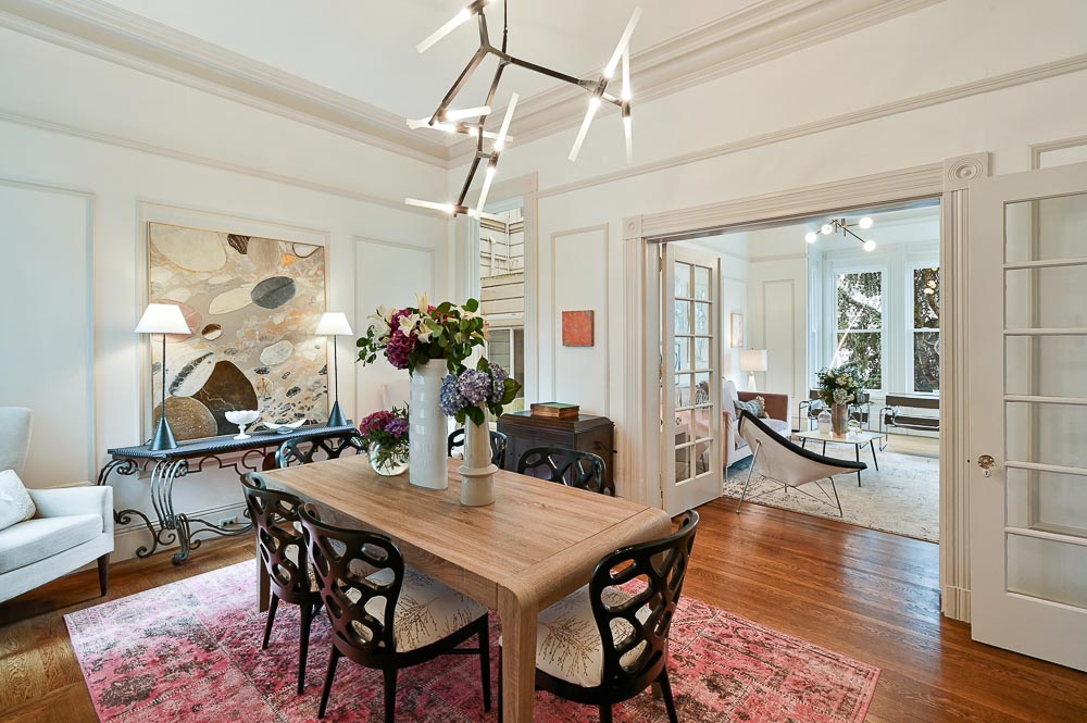 Property Photo: Dining room, with a view through the french doors leading to the living room