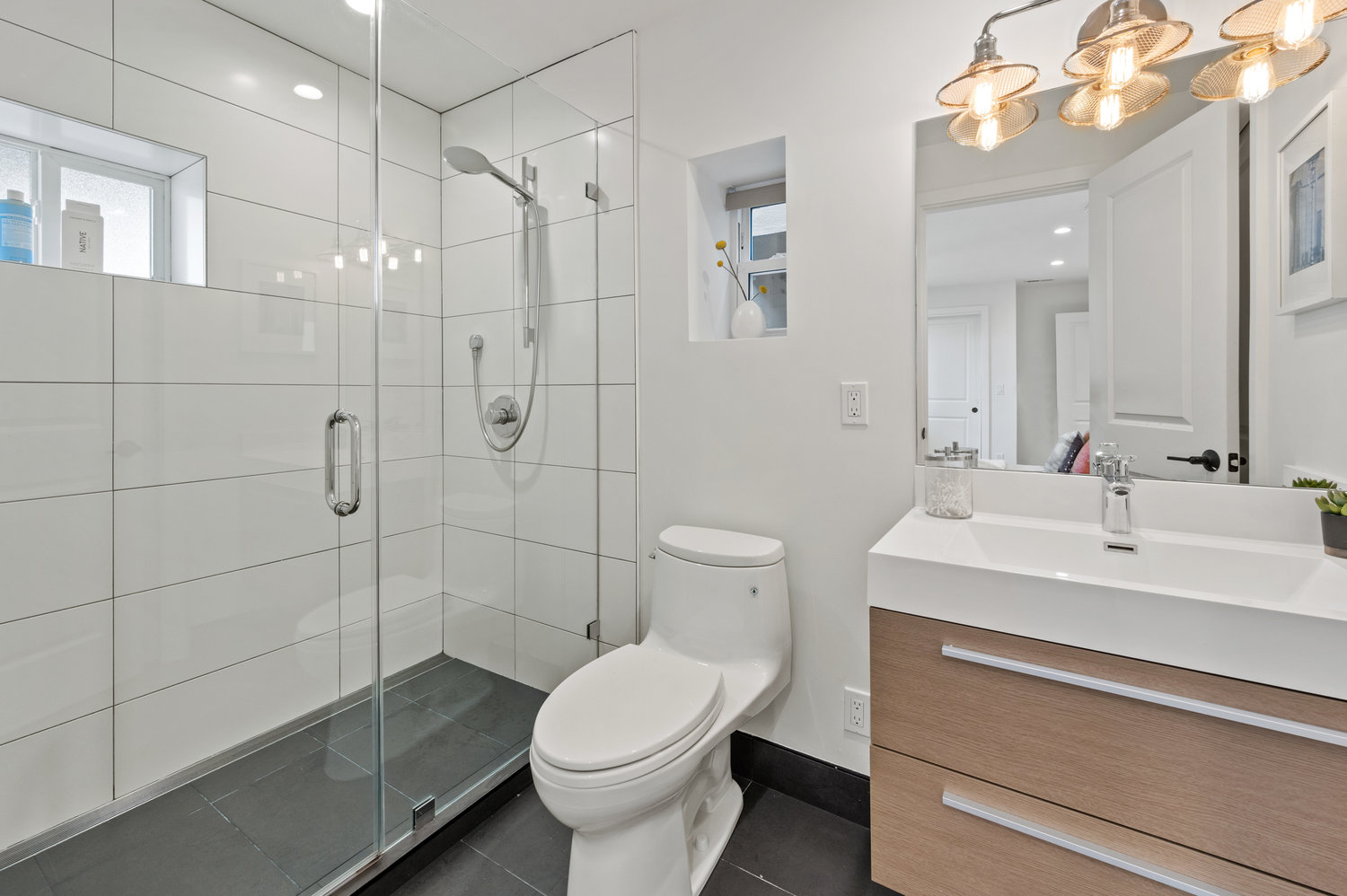 Property Photo: Ensuite bathroom with lux glass shower