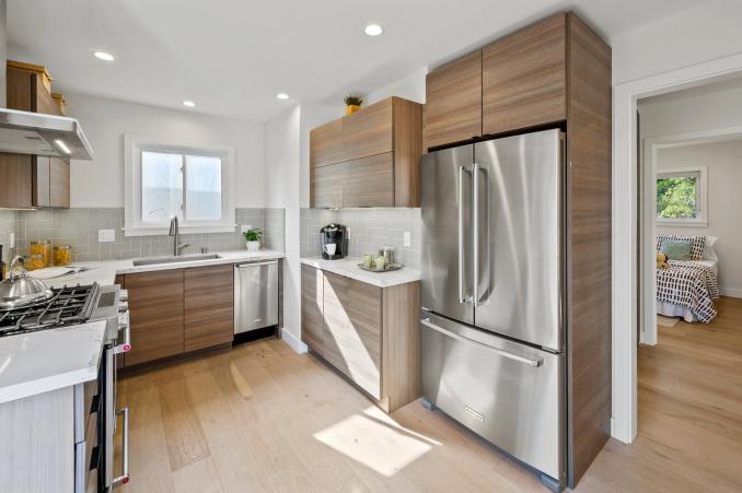 Property Thumbnail: Kitchen, with a view of a nearby bedroom