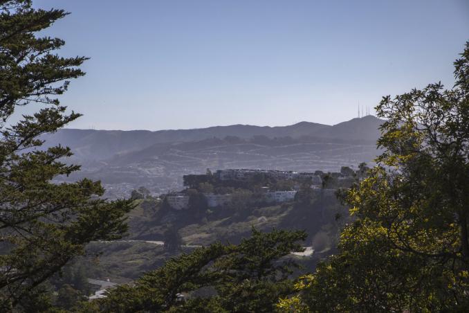 Property Thumbnail: Hilly wooded views of San Francisco as seen from 156 Midcrest, presented by John DiDomenico