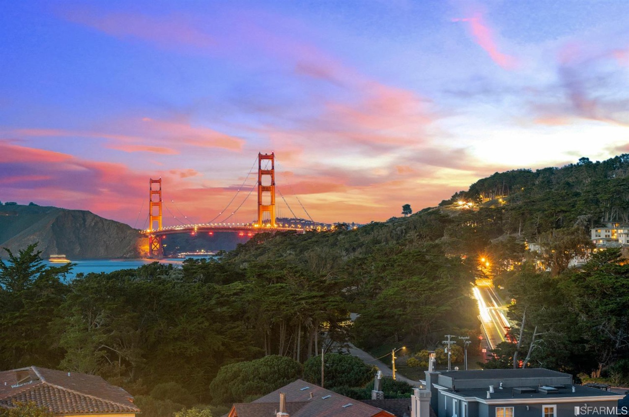 Property Photo: View of the Golden Gate Bridge at twilight as seen from 2212 Lake Street