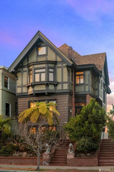 Property Thumbnail: Front facade of 2212 Lake Street, showing a large Tudor-style home in San Francisco purchased via John DiDomenico