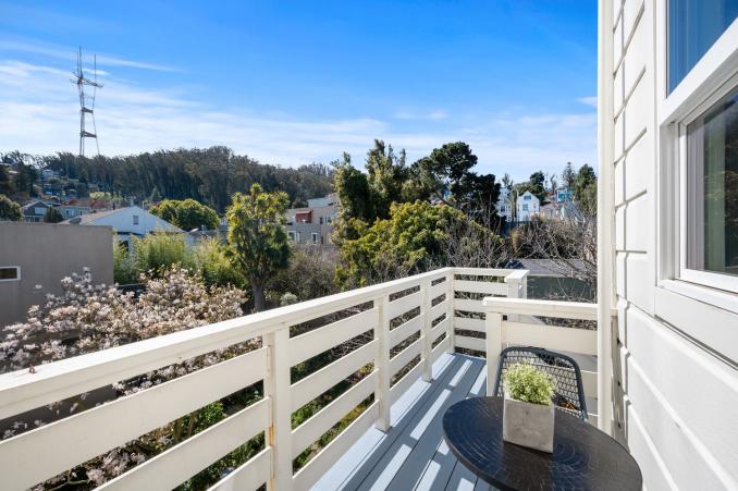 Property Thumbnail: Deck with a sitting area and sweeping views of Cole Valley and Sutro Tower