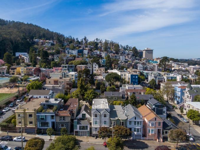 Property Thumbnail: Aerial view of 1223 Shrader Street, showing Cole Valley and San Francisco beyond