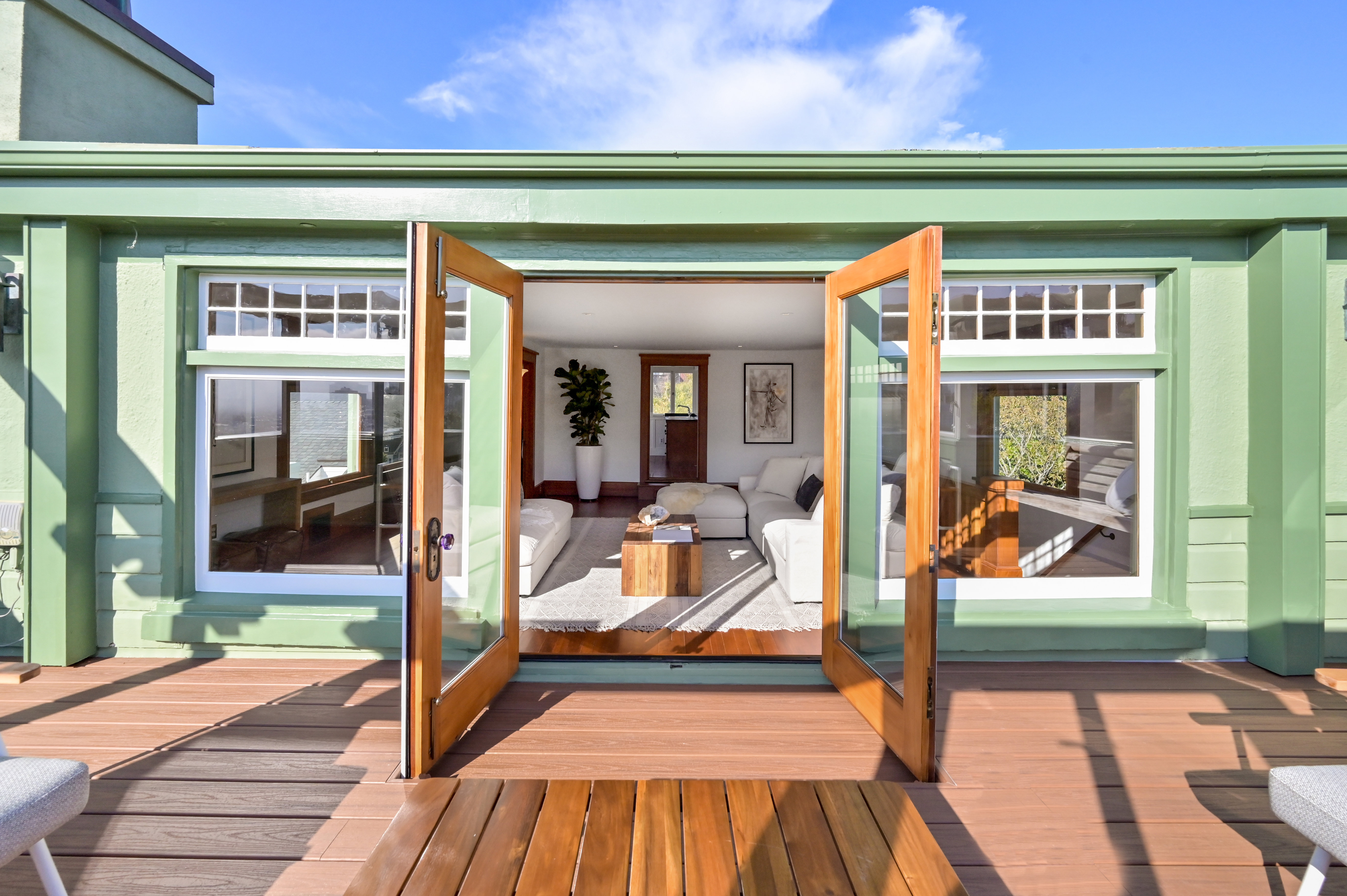 A large view deck with French doors in a home on Ashbury Terrace, sold by John DiDomenico
