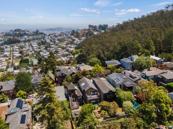 Property Thumbnail: View of 205 Edgewood Avenue from above, showing San Francisco Bay