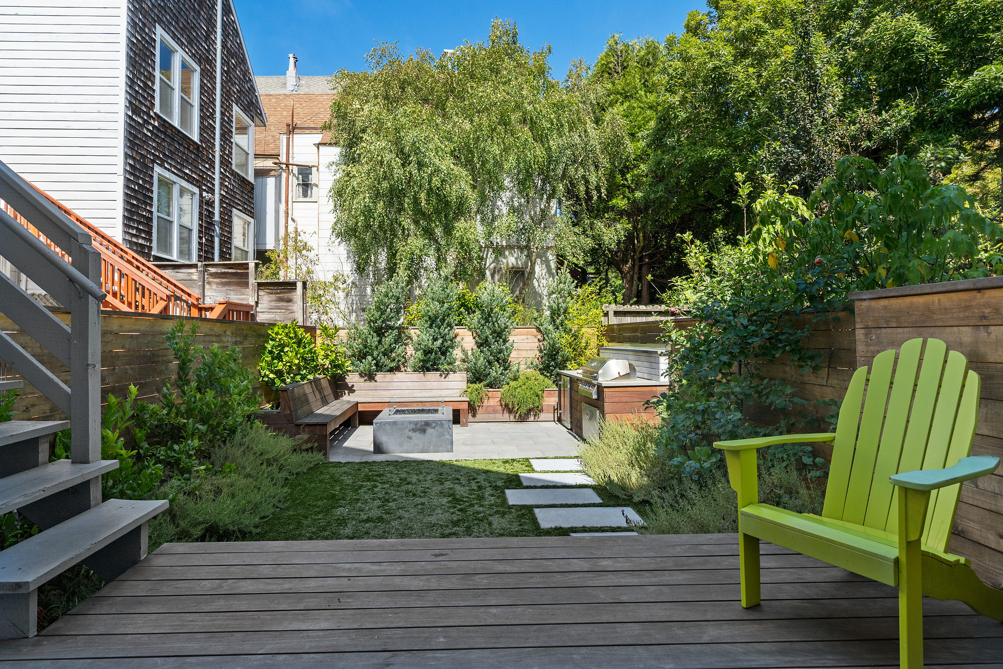 Property Photo: Wood deck with seating area