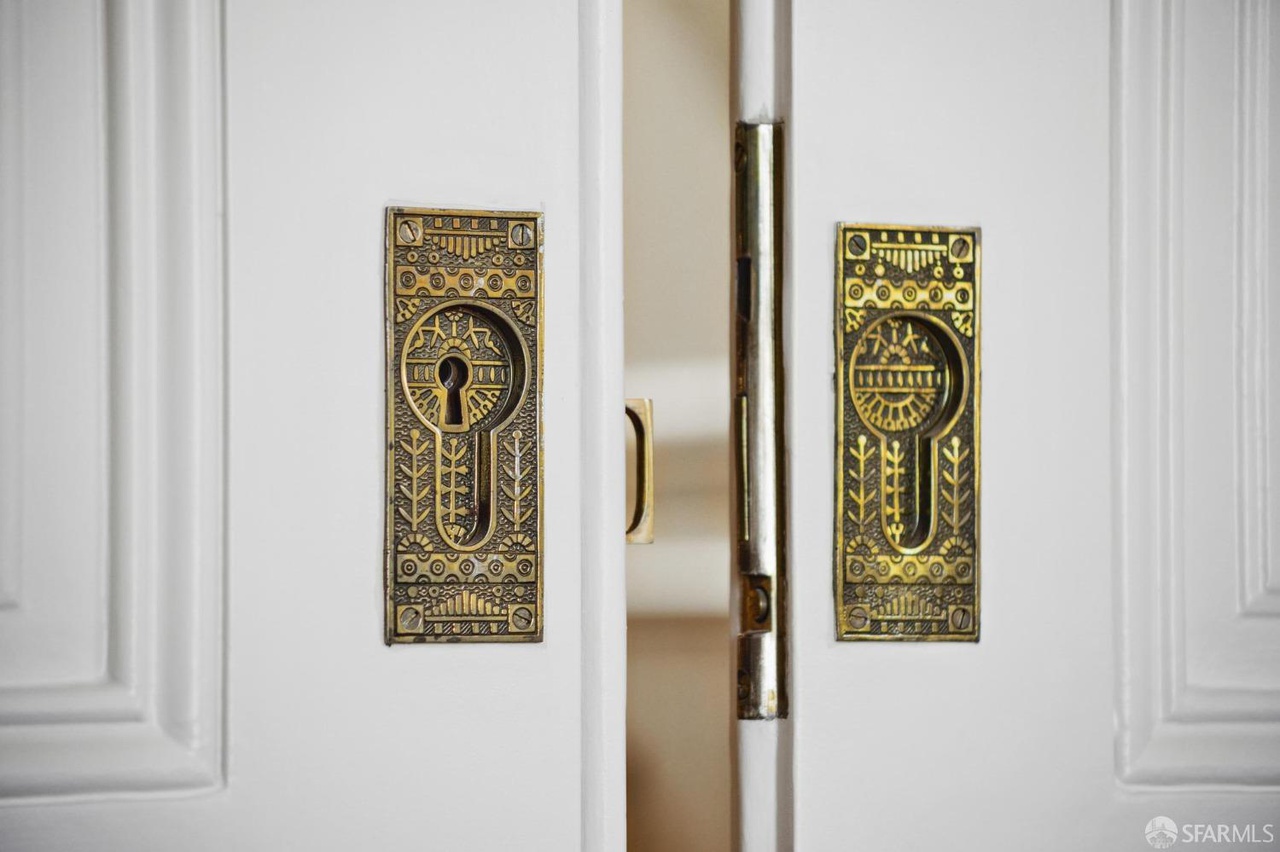 Property Photo: Close up of the vintage door locks. 