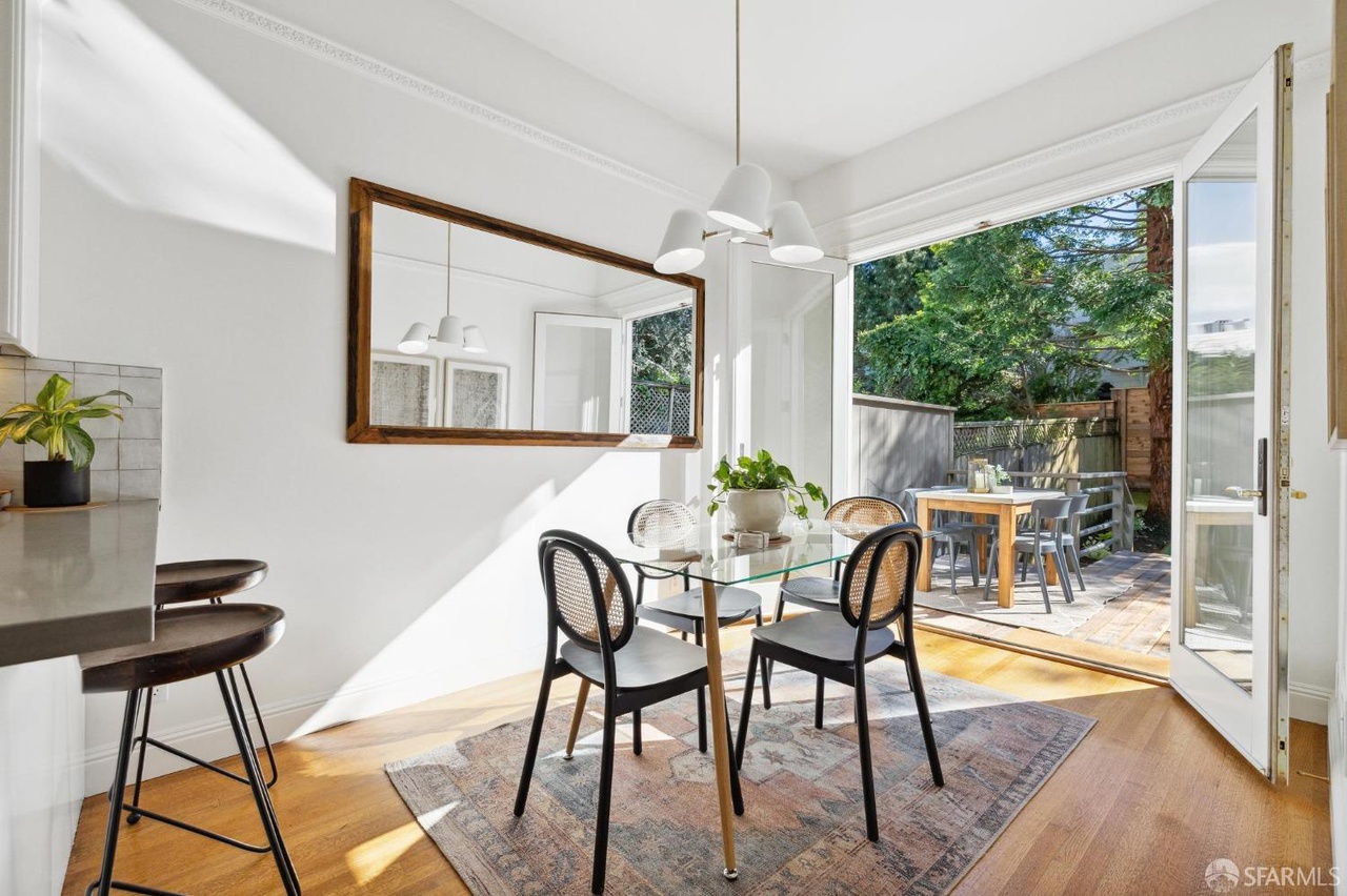 Property Photo: Kitchen has an eat in element that has large french doors that open to back yard.