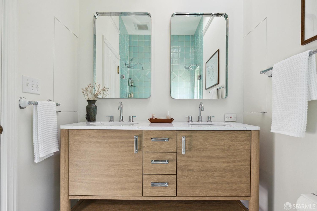 Property Photo: Primary on suite bathroom has double vanity.