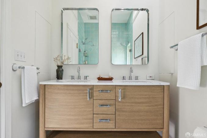 Property Thumbnail: Primary on suite bathroom has double vanity.