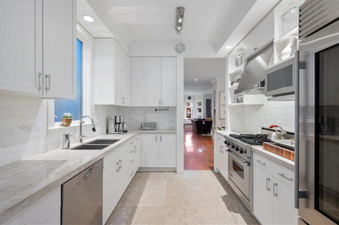 Property Thumbnail: Kitchen is nicely updated with lots of counter space to the left. 