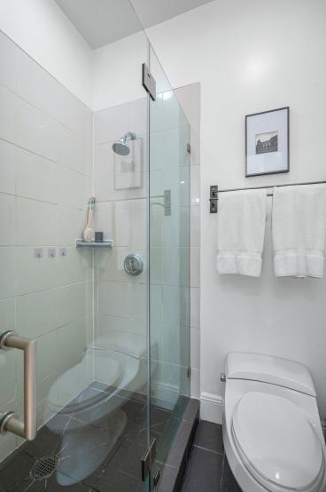 Property Thumbnail: Bathroom has stand up shower with glass doors. 