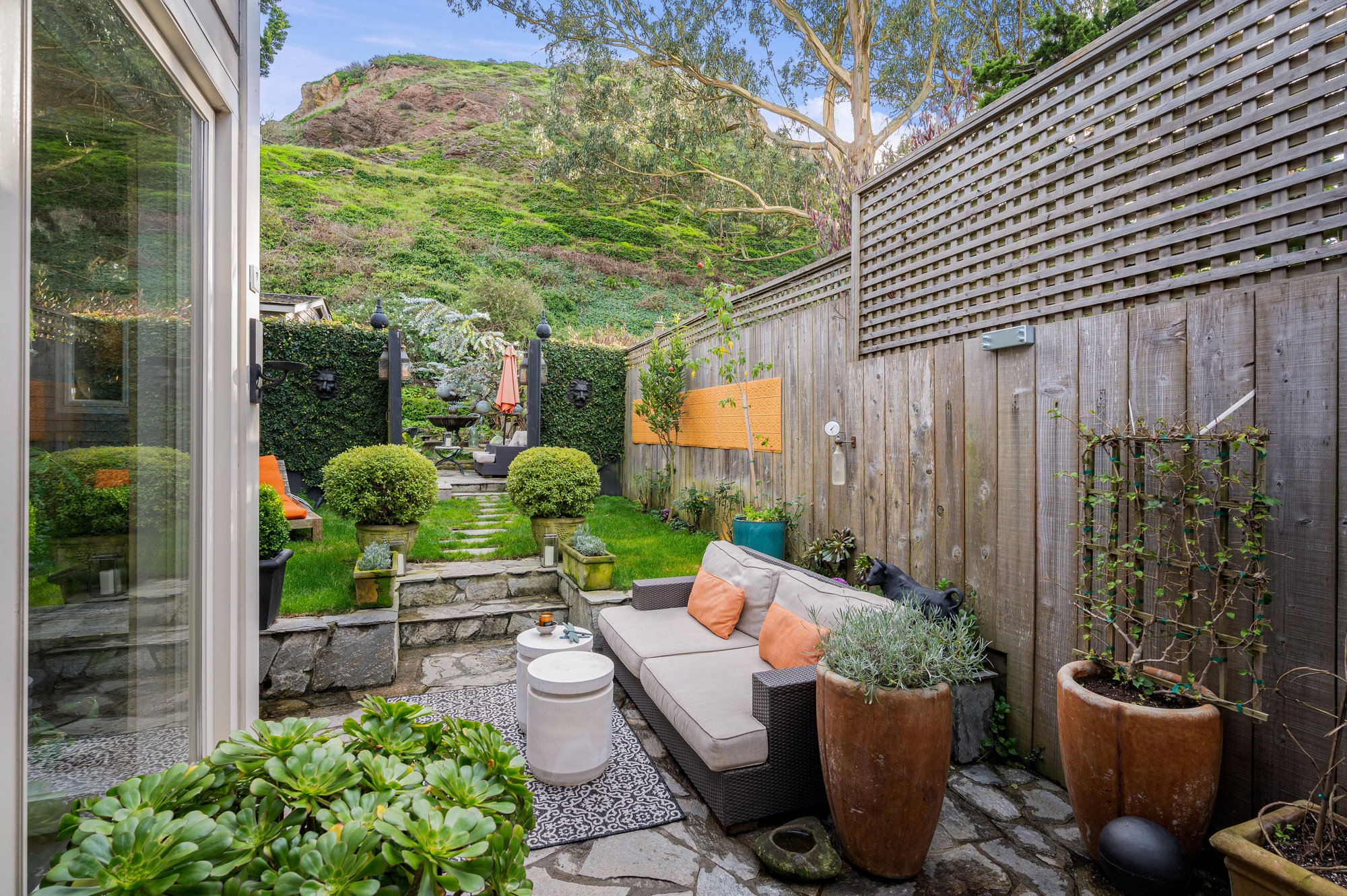 Property Photo: There is large wooden fence that allows for a lot of privacy in back yard.