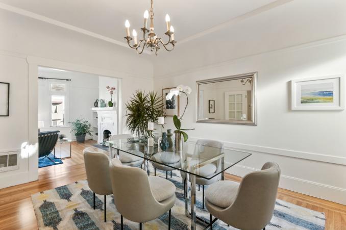 Property Thumbnail: Formal dining area with wood floors and white walls