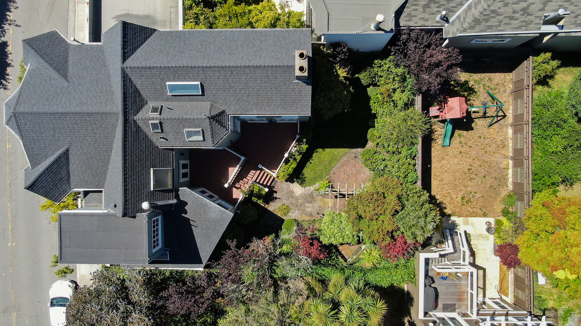 Property Photo: Aerial view of the yard, showing the expansive space and plant-life