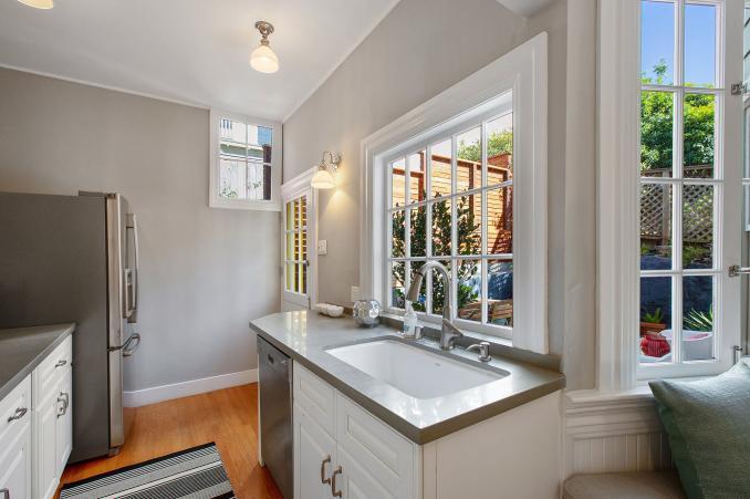 Property Thumbnail: Kitchen, featuring large windows and sink area