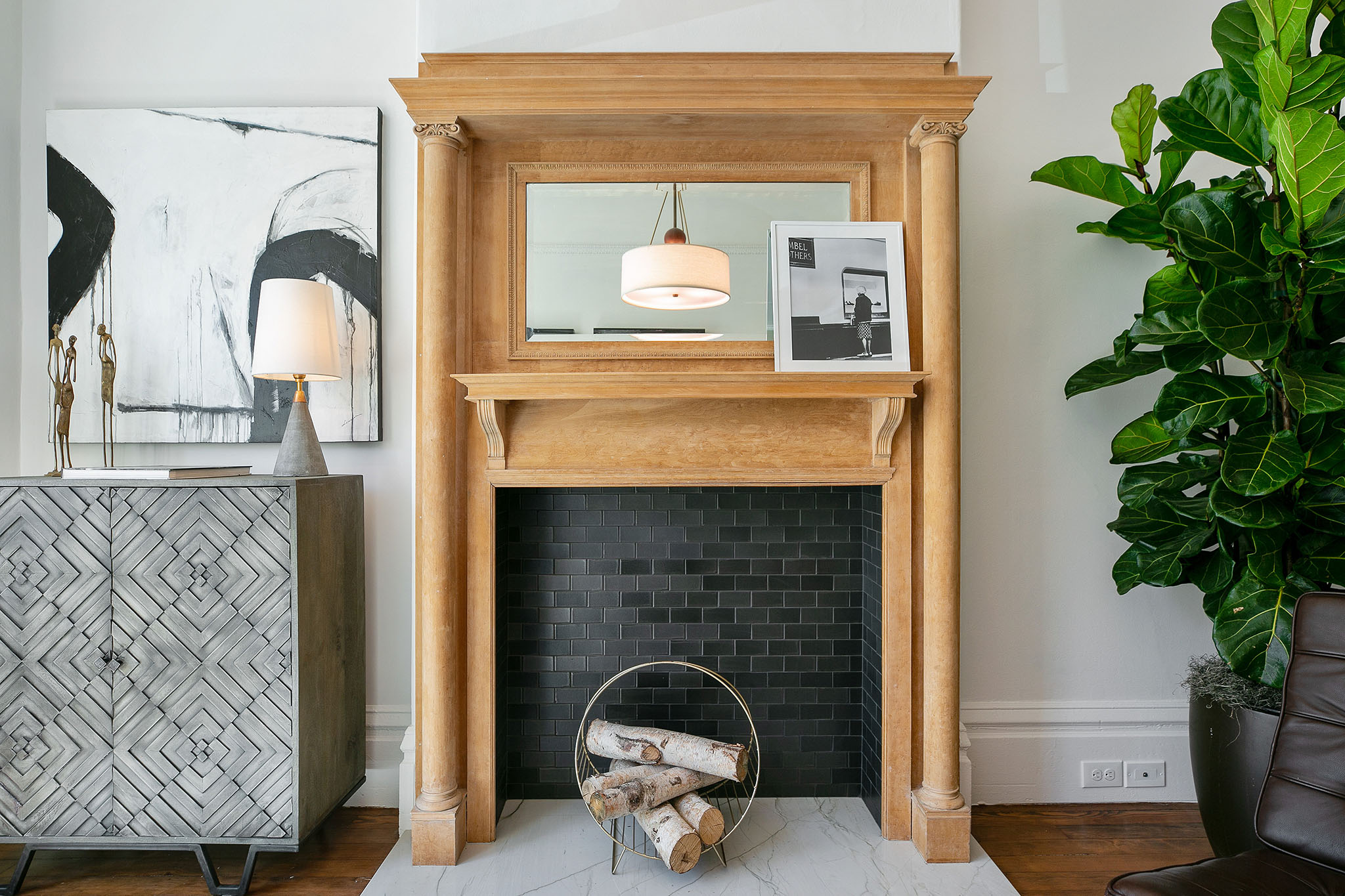 Property Photo: Close-up of the beautiful wood mantle in the living room