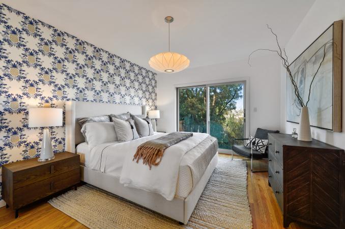 Property Thumbnail: A third large bedroom with glass doors leading out