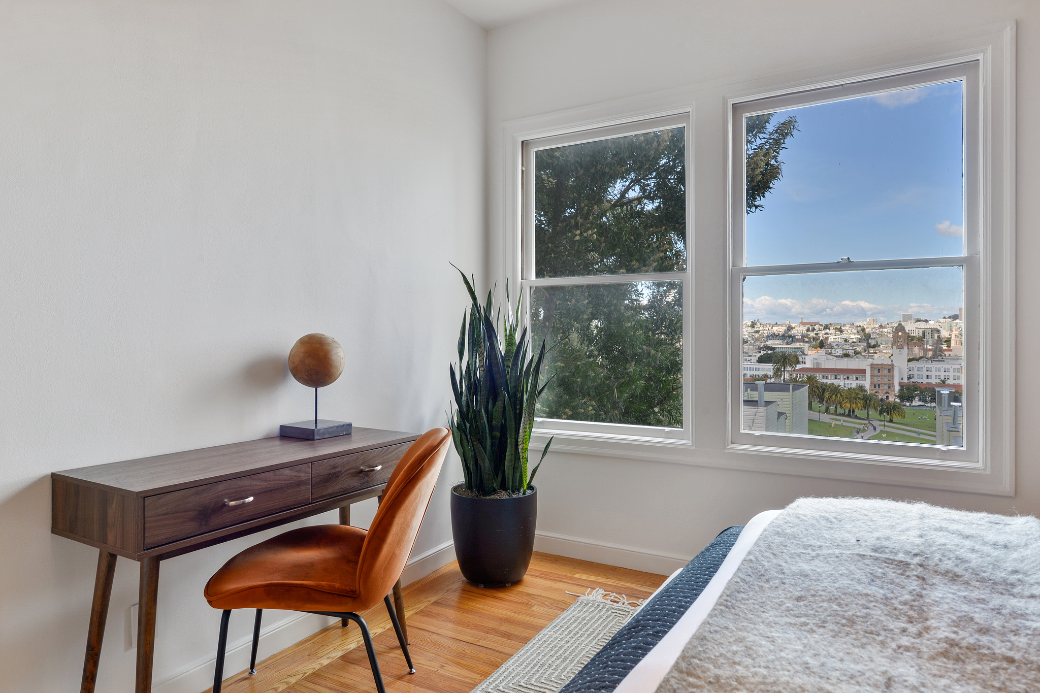 Property Photo: Bedroom windows with clear view of Delores Park and downtown San Francisco
