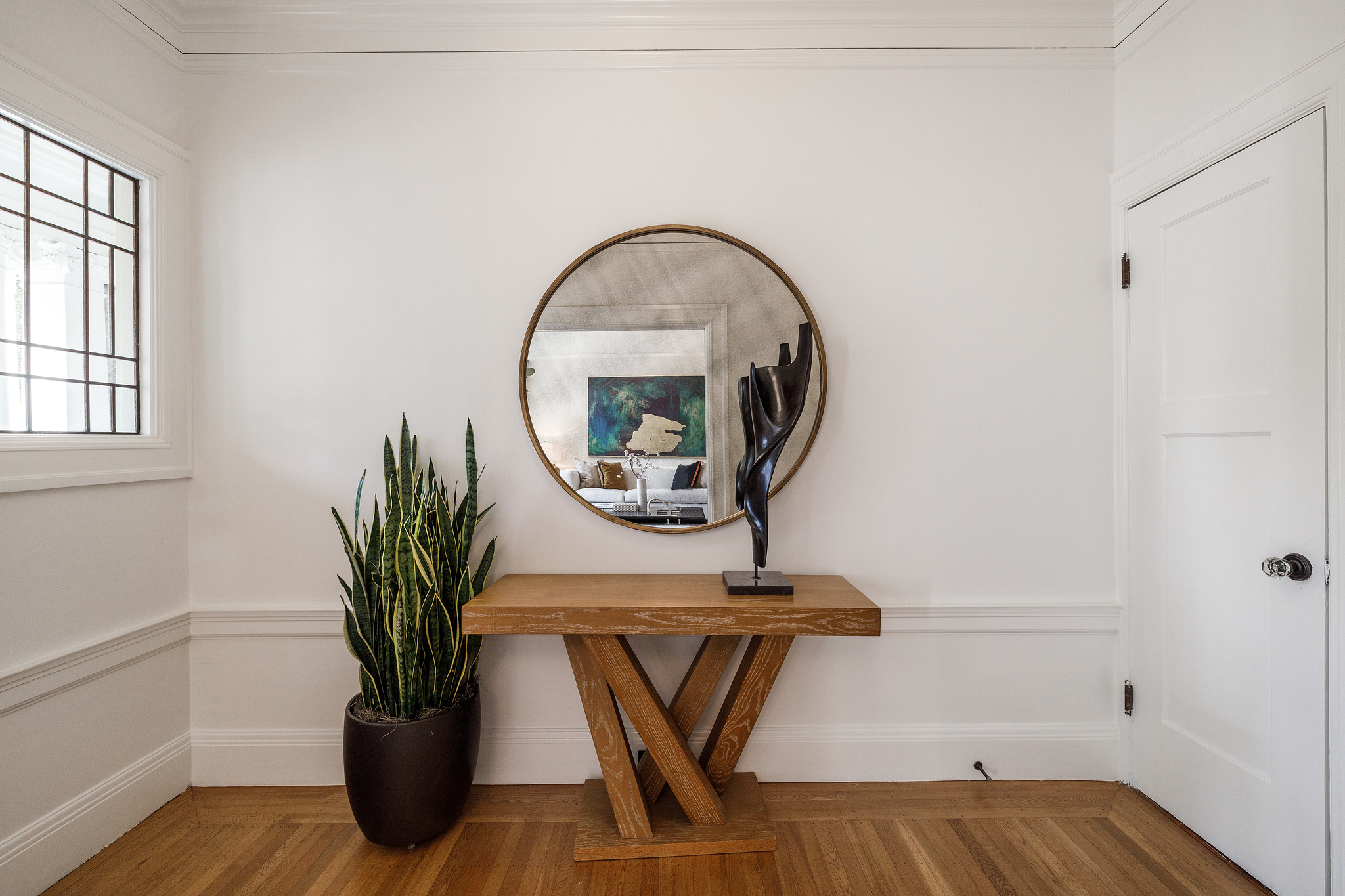 Property Photo: View of the entry area with white trim and wood floors