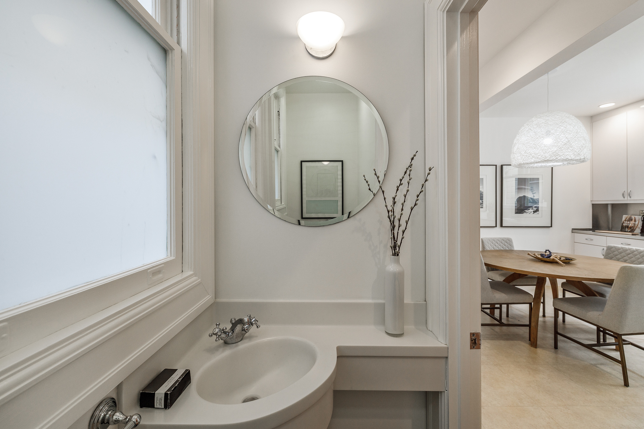 Property Photo: Bathroom with partial view into the dining area