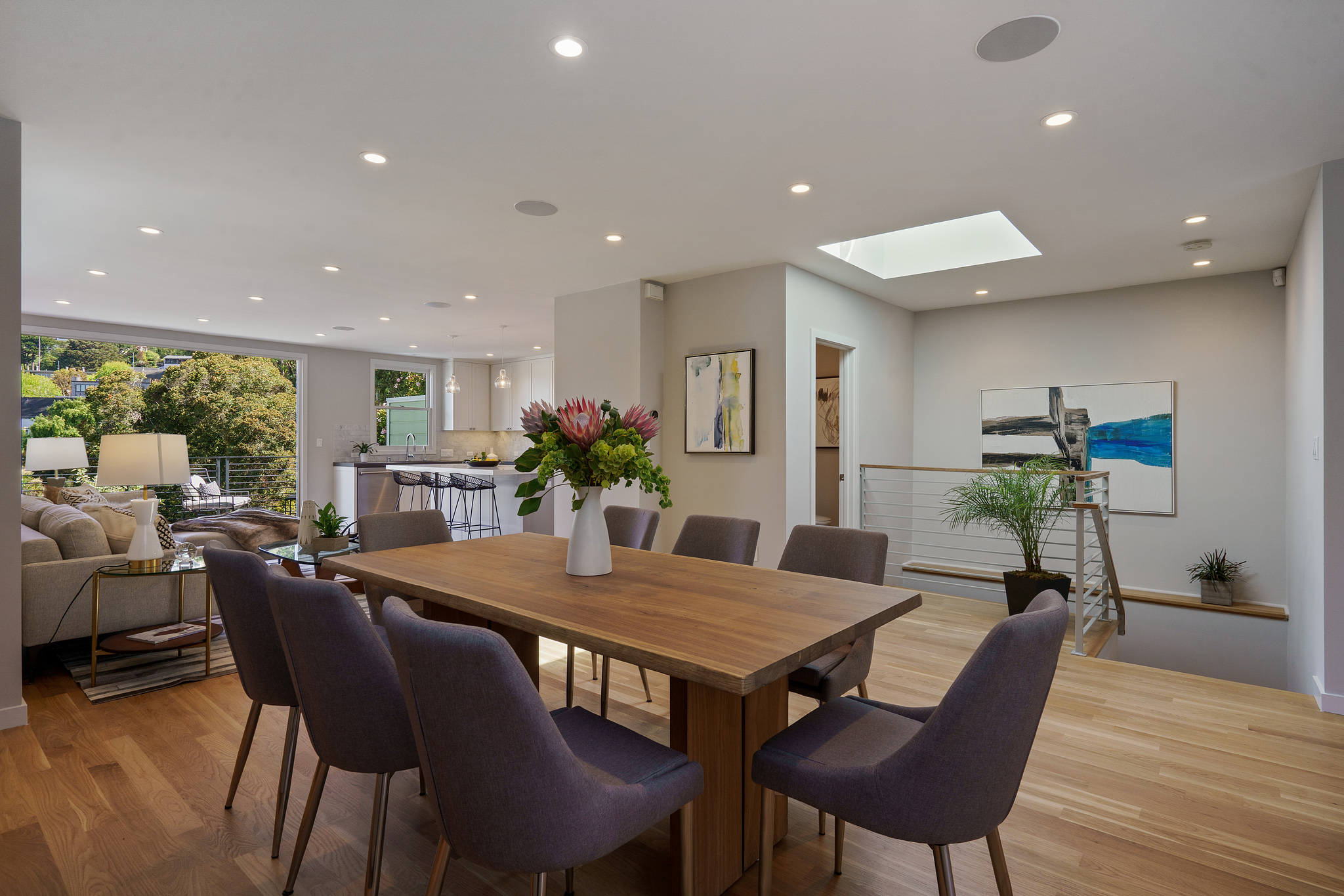 Property Photo: Dining area, showing a skylight over stairs leading down