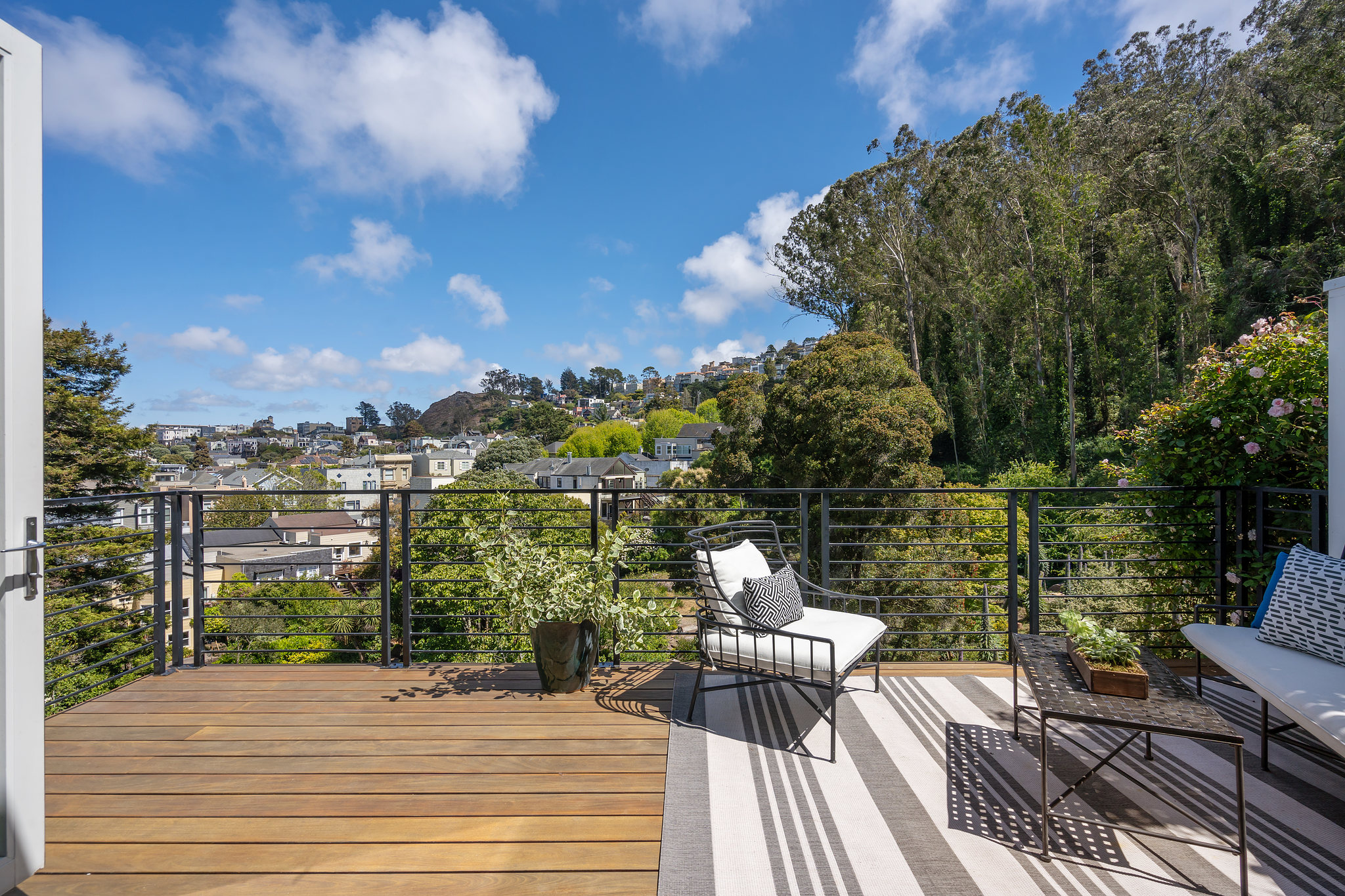 Property Photo: Outdoor living area overlooking Sutro Forrest and Cole Valley
