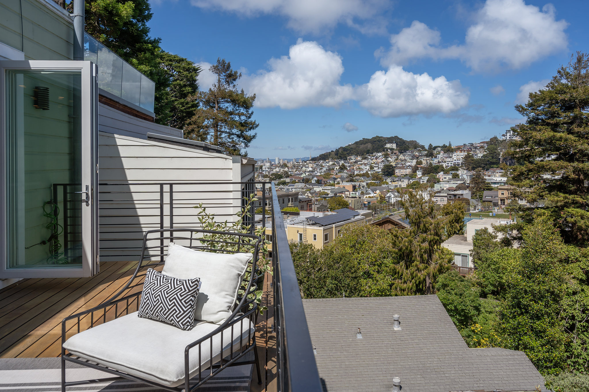 Property Photo: A view of Cole Valley and neighboring homes as seen from the railing